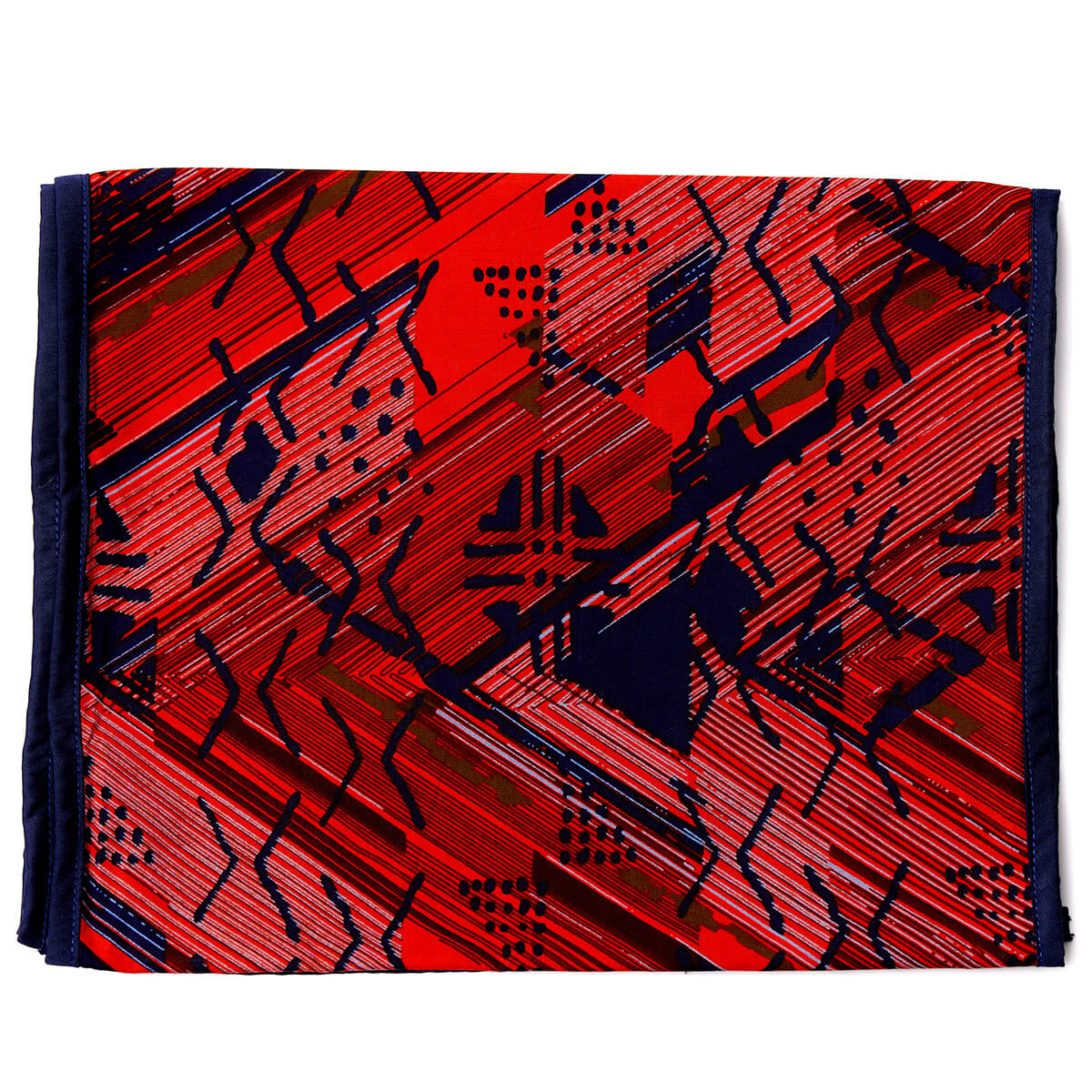Red and black abstract African print headwrap featuring geometric patterns on soft fabric.